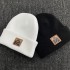 Wholesale Custom Logo Leather Rubber Patch Beanie Hats Embroidered Acrylic Knitted Cuff Beanie Fisherman Skull Cap Winter Hat